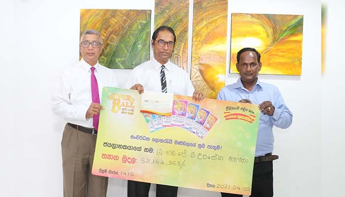 DLB awarded the cheque to Super Ball super jackpot winner